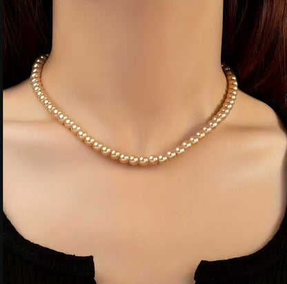 Noelle | french-style ball necklace