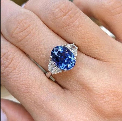 Three-Stone Oval Cut Blue Sapphire Engagement Ring